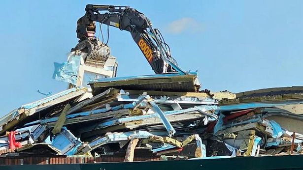 UK's 'ghost city' razed to the ground after flat pack homes stood unfinished for a year