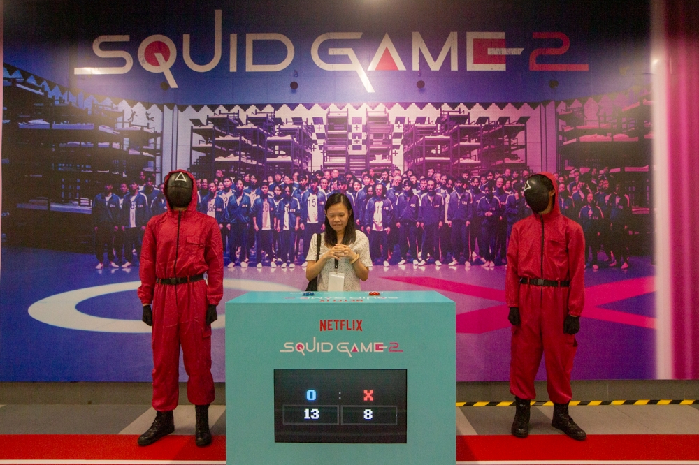 ‘Squid Game’ takes over Ampang Park MRT: What games can you play there from Dec to Jan?