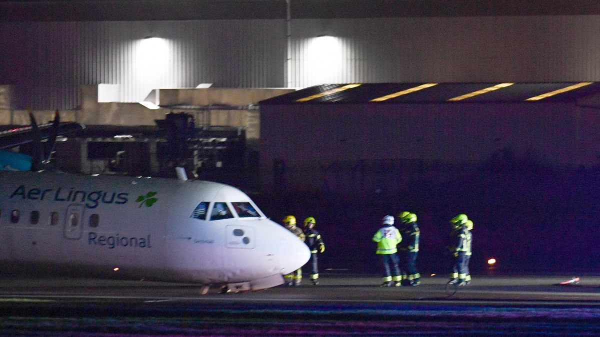 Belfast airport: Plane crash lands as landing gear collapses whilst 82mph winds batter UK