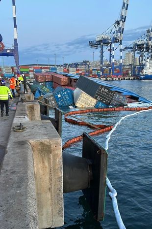 Crew miraculously escape capsized cargo ship as giant containers plummet into the sea