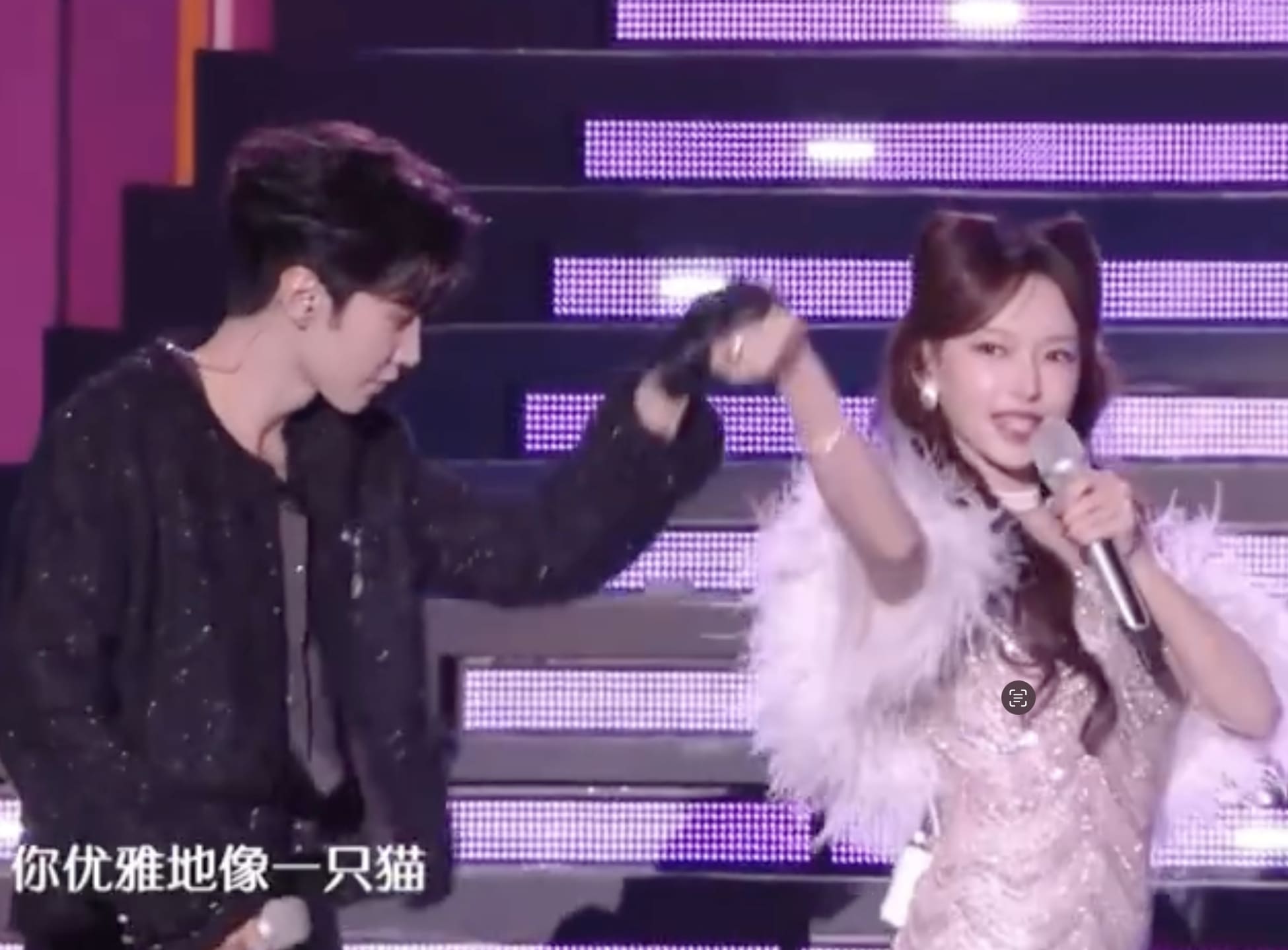 Chinese Actor Busted For Lip-Syncing After Forgetting To Use Mic While Performing