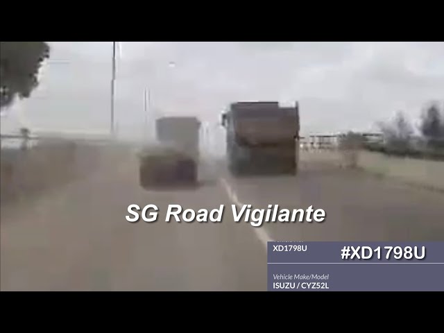 seletar north link isuzu truck overtaking recklessly at a slope