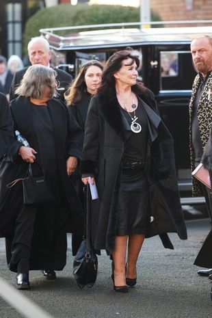 Coleen Nolan wipes away tears as she pays her respects to beloved sister Linda at funeral