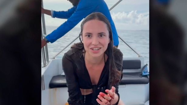 Influencer shakes with fear after being bitten by a shark as she asks friend if she'll die