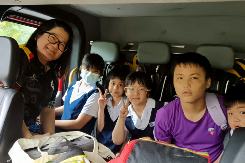 Stranded pupils, school staff evacuated after flood cuts off Sibu school’s main road