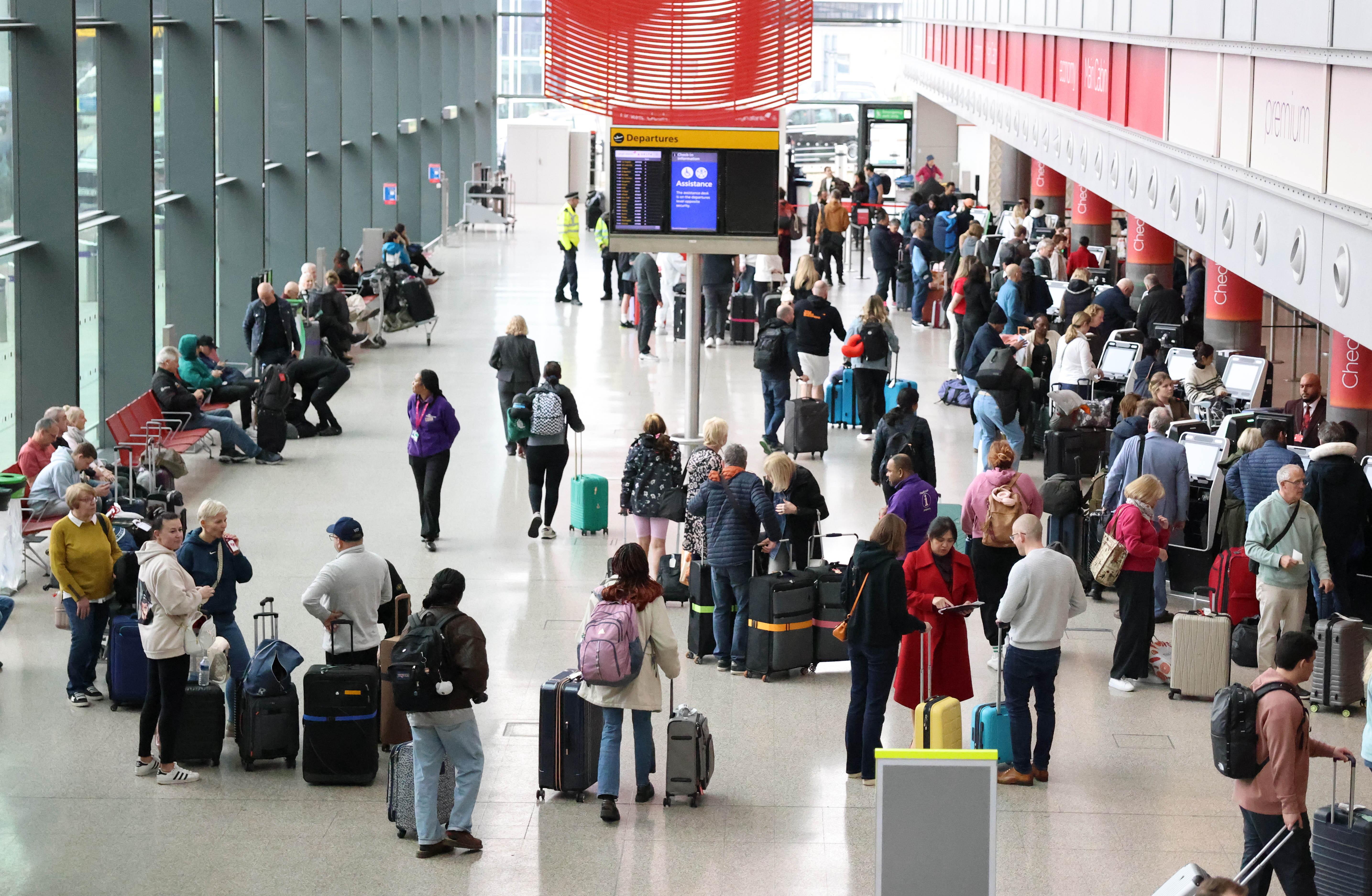 ‘So eager to get back’: Travellers pour into a reopened Heathrow