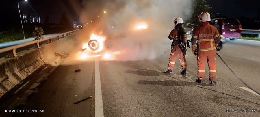 Two injured as car bursts into flames in accident