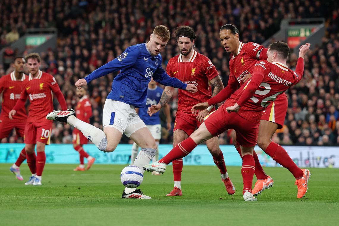 Liverpool restore 12-point lead as Jota seals win over Everton