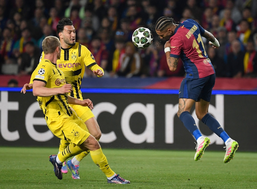 Barca throttle Dortmund 4-0, Flick demands more despite rout