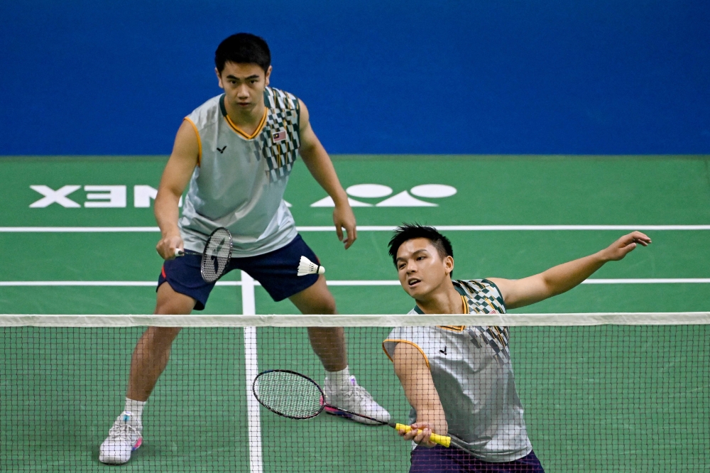 Goh Sze Fei-Nur Izzuddin dig deep in Paris to overcome American duo