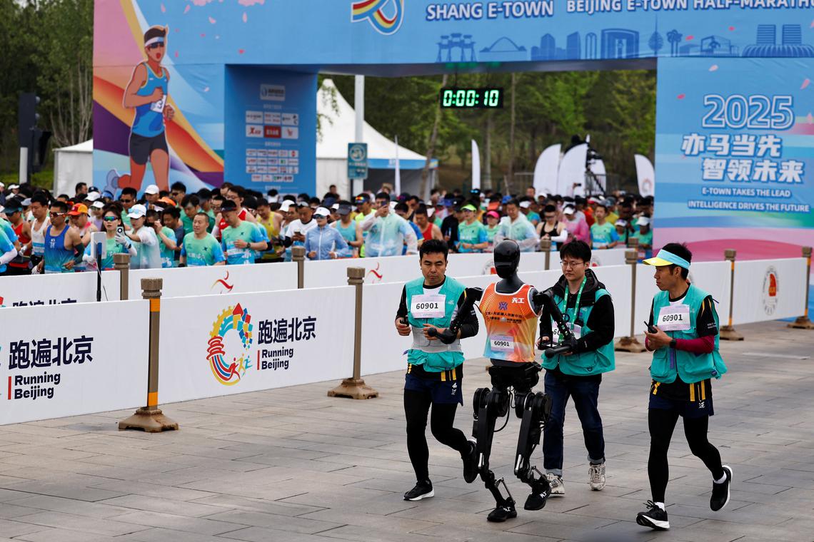 China pits humanoid robots against humans in half-marathon