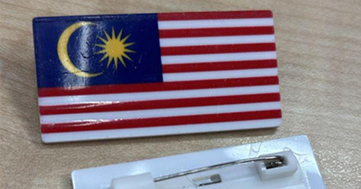 教育部:国旗徽章培养爱国 学生未佩戴不会受处罚