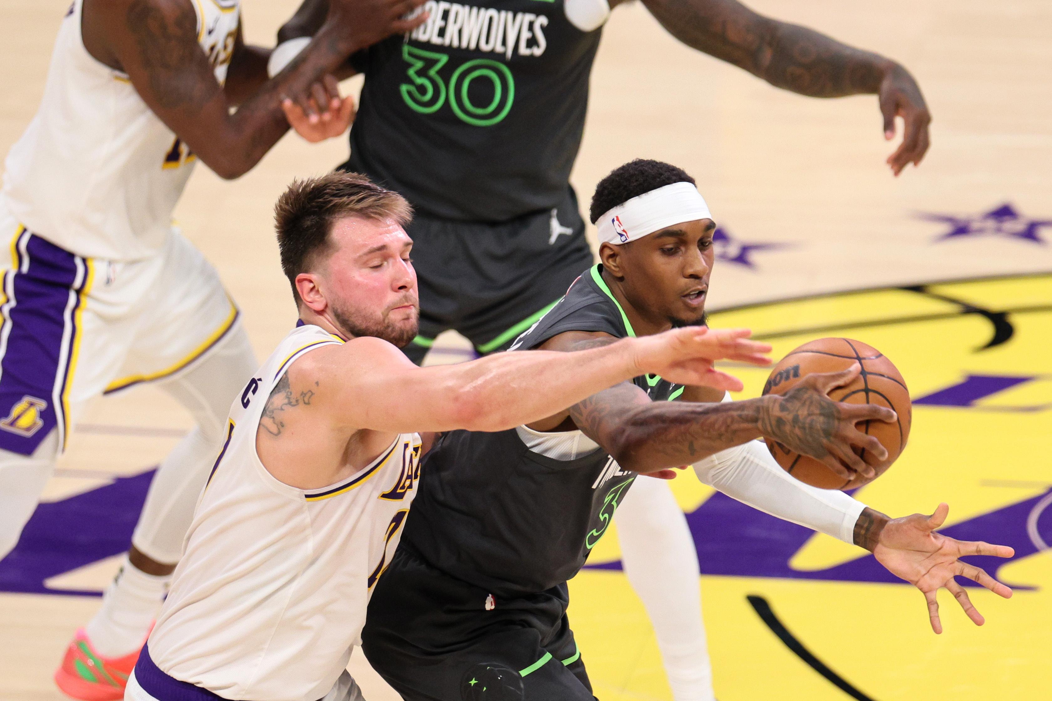 Physical Minnesota Timberwolves muscle past Los Angeles Lakers 117-95 in play-off opener
