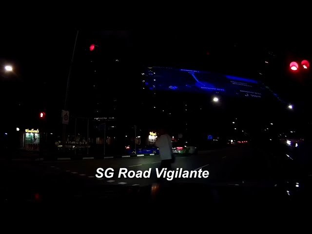 Woodlands Avenue jaywalking pedestrian on the phone