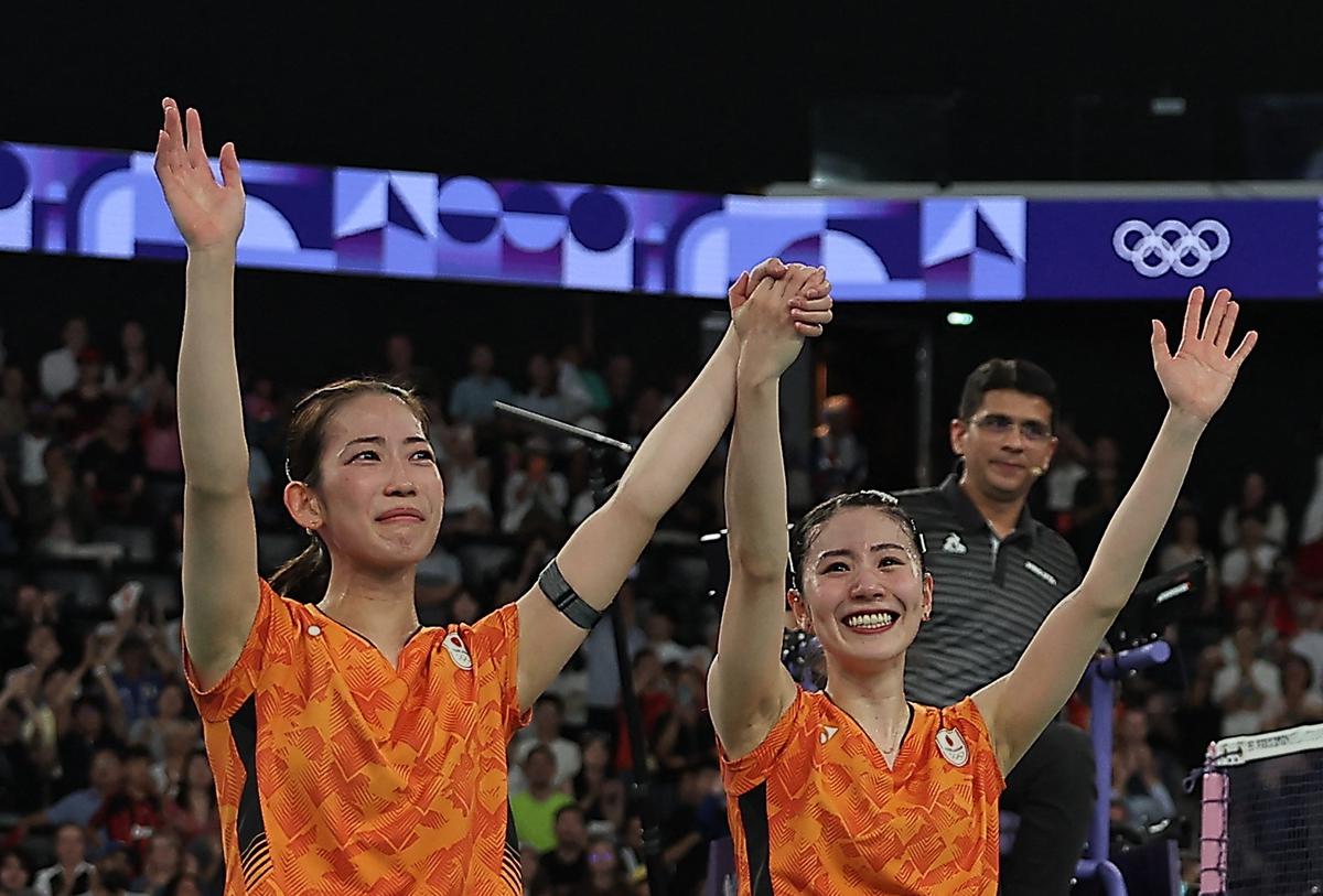 Japan and Indonesia top their groups at Sudirman Cup