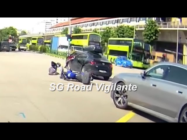 Yishun Ave mazda rear end motorcyclist in yellow junction box