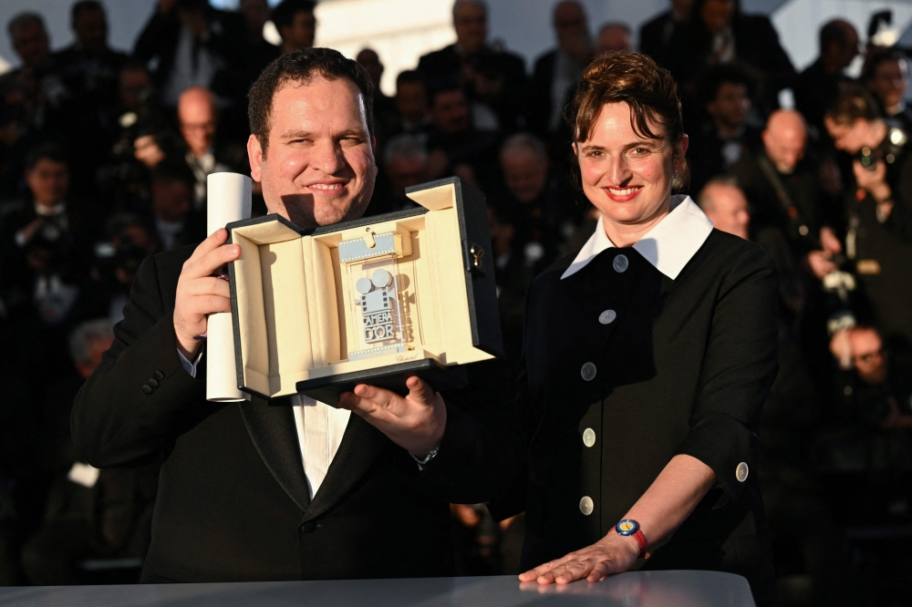 Iraqi director Hasan Hadi wins top Cannes debut prize for childhood tale set under Saddam’s rule