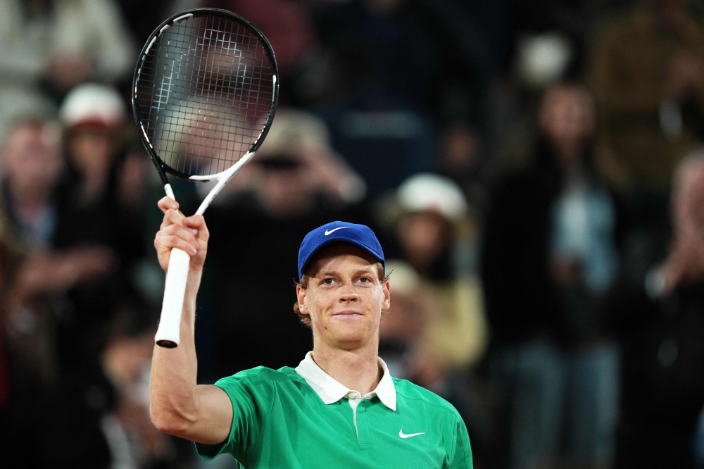 From suspension to second round: Tennis top seed Jannik Sinner overcomes Arthur Rinderknech in French Open