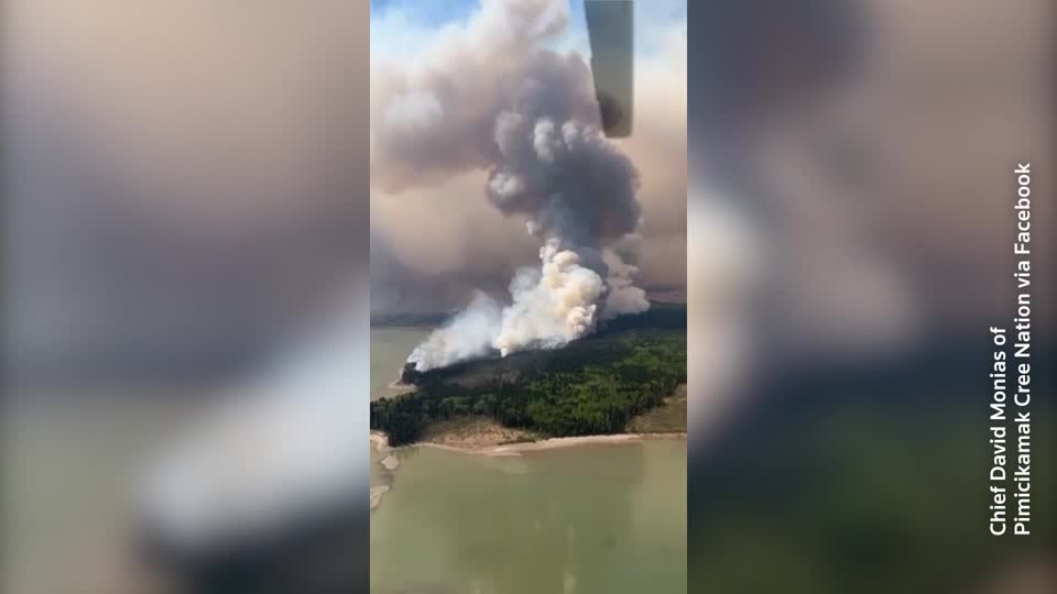 Aerial footage shows wildfires spread in Canada's manitoba