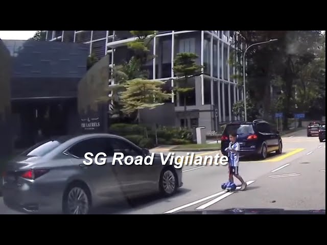 cairnhill road child on kick scooter left behind to cross cairnhill road on his own