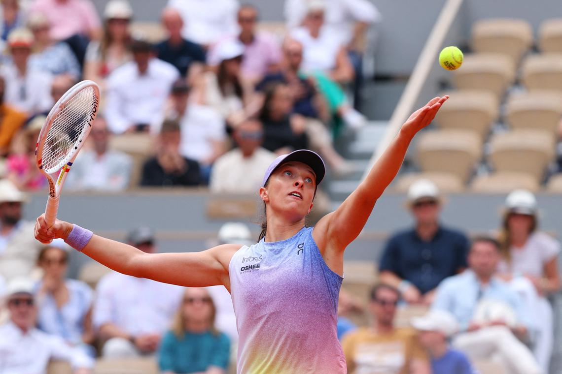 Swiatek digs herself out of deep hole, Alcaraz powers on at French Open