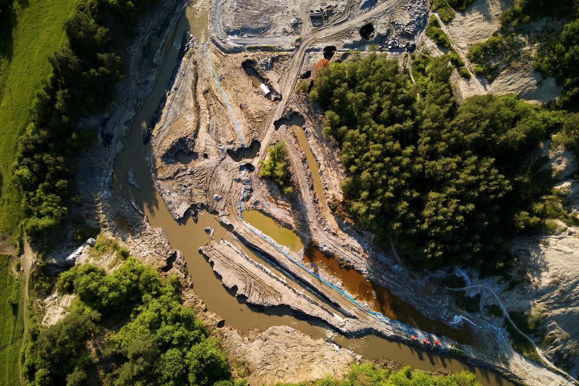 Romanian officials reroute flooded stream away from Praid salt mine