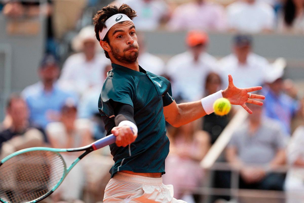Musetti fights past Tiafoe to meet Alcaraz in French Open semis