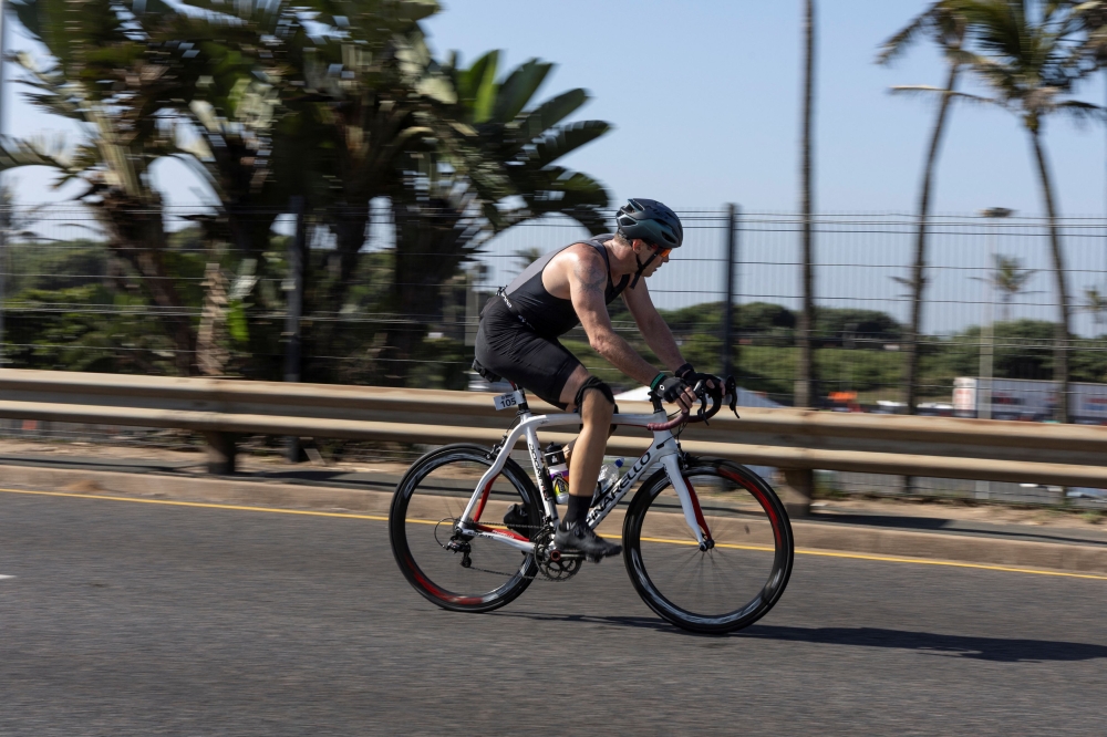 ‘Blade runner’ back in the race: Oscar Pistorius competes in Durban triathlon a year after parole for killing girlfriend