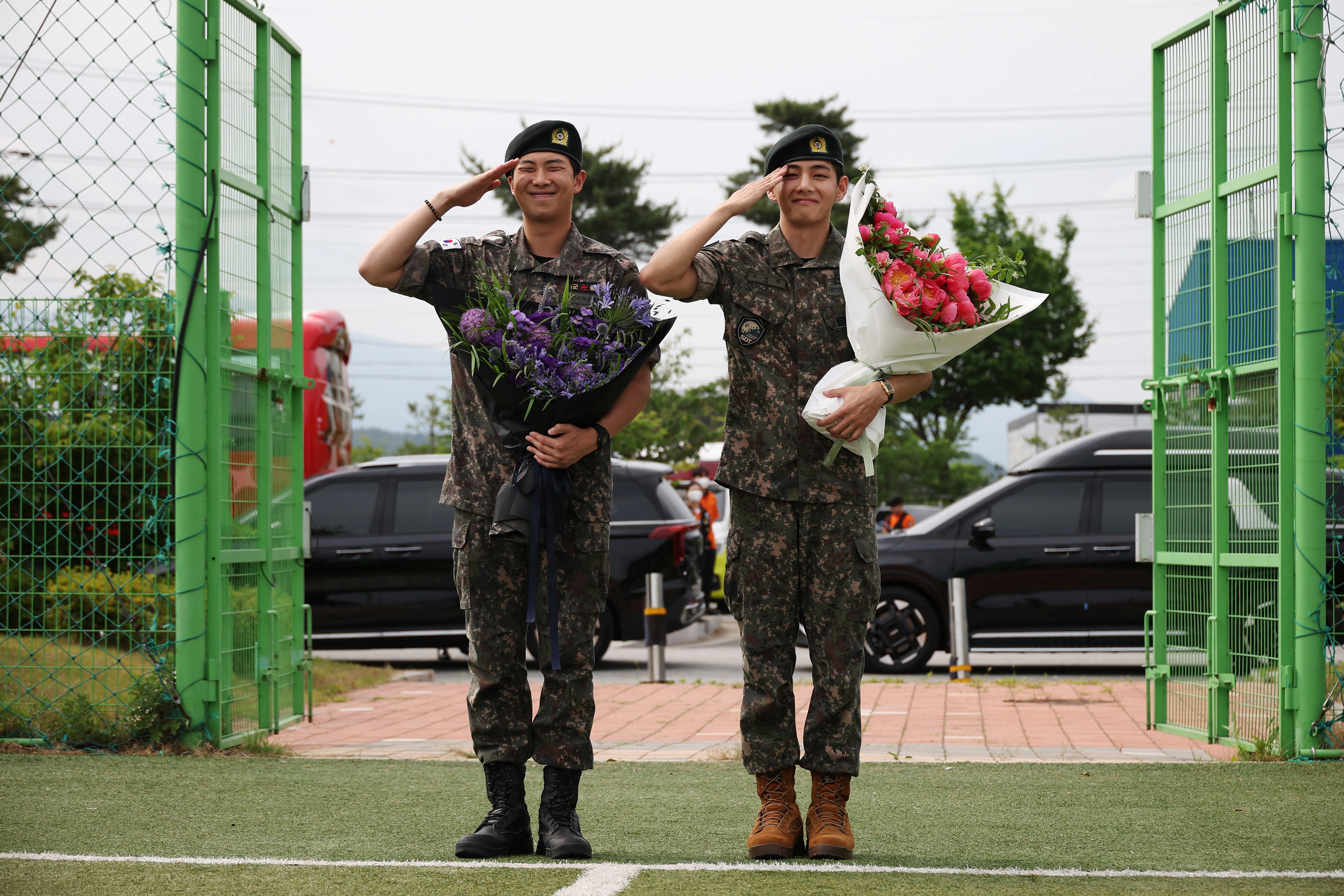 K-pop superstars RM and V from BTS released from military service