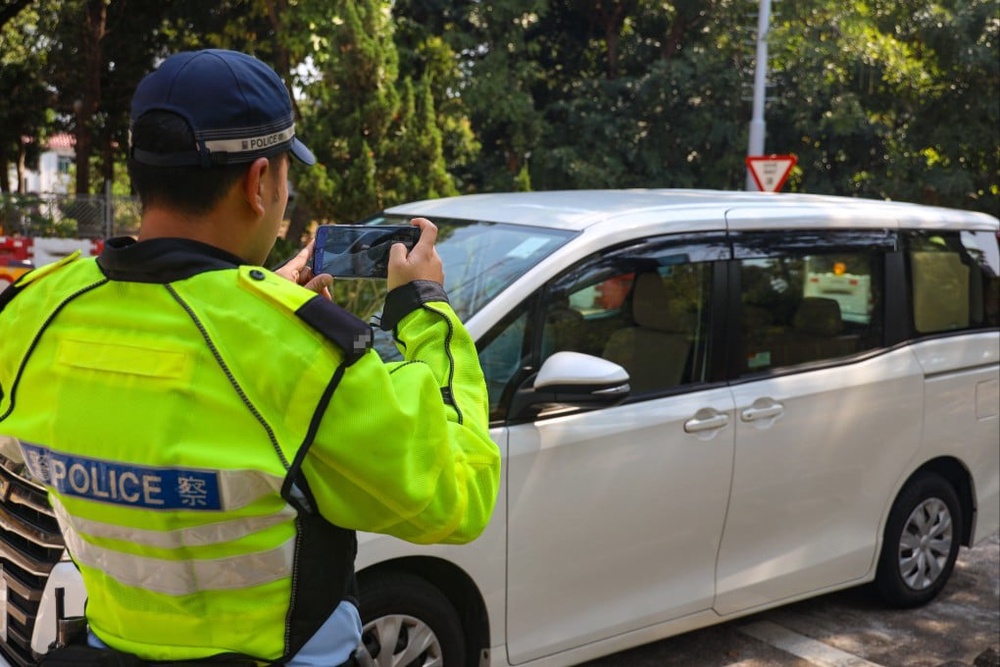 Hong Kong police start issuing digital parking fines, but some drivers puzzled
