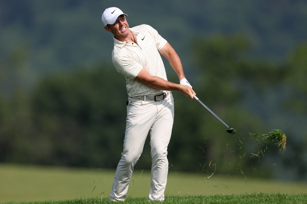 Burns leads US Open as McIlroy scrapes into weekend, DeChambeau eliminated
