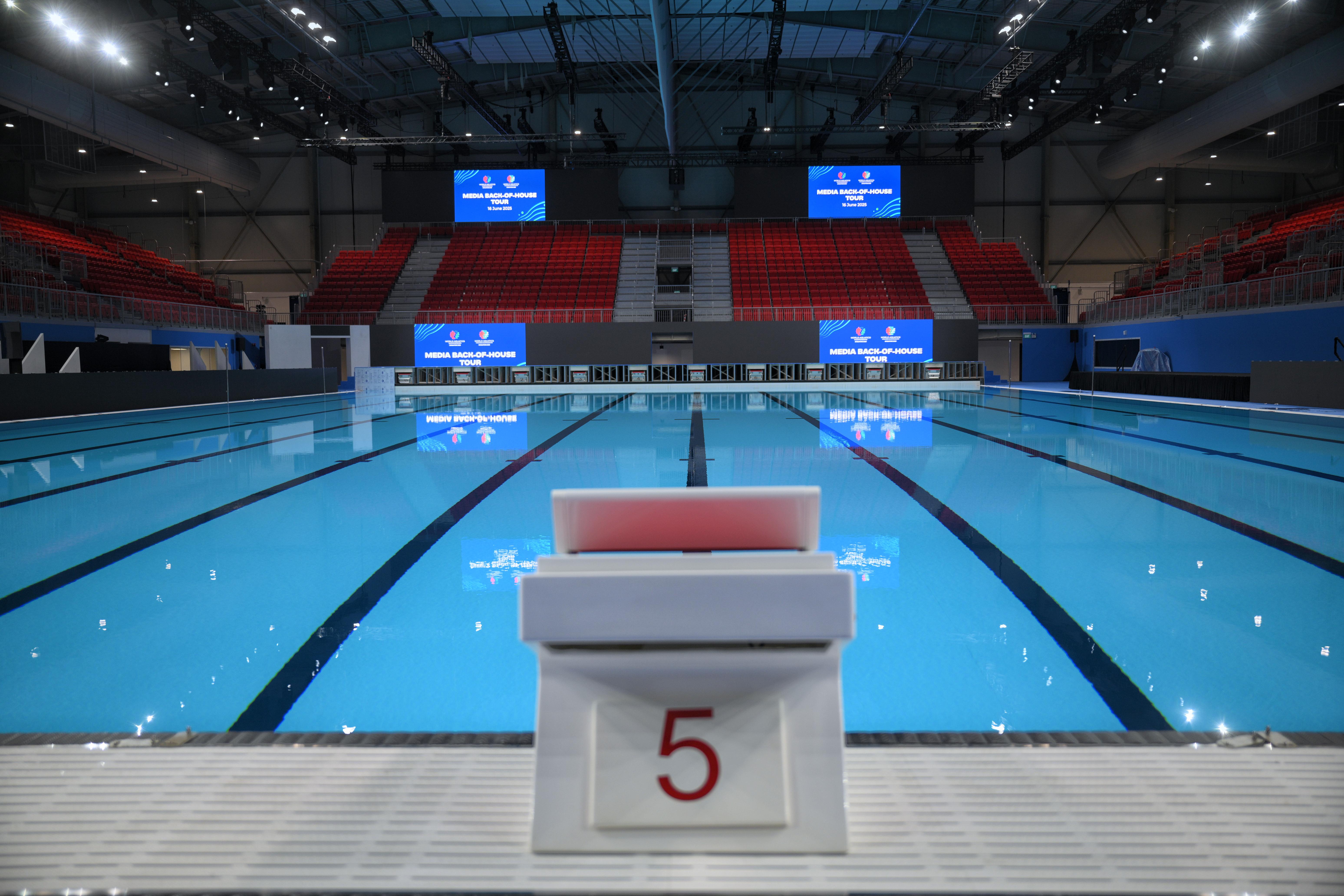 Swimmers racing in a car park? How can you not go and watch?