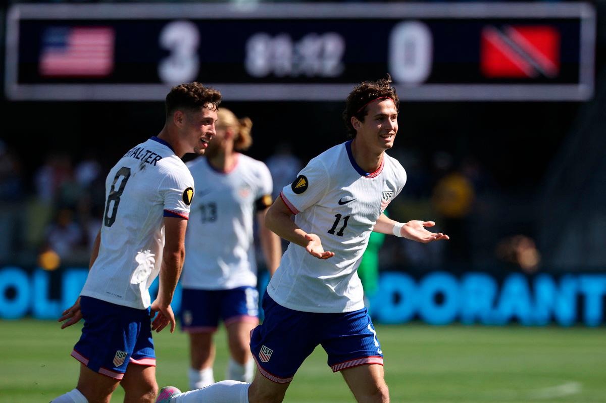 USA end losing streak with crushing of hapless Trinidad