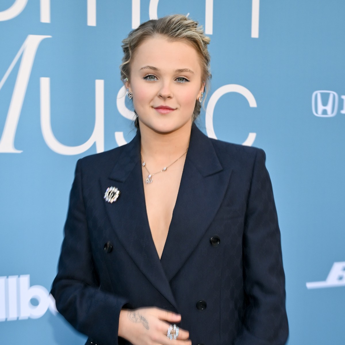 Why JoJo Siwa Felt Pressure to Come Out as a Lesbian Years Before Chris Hughes Relationship