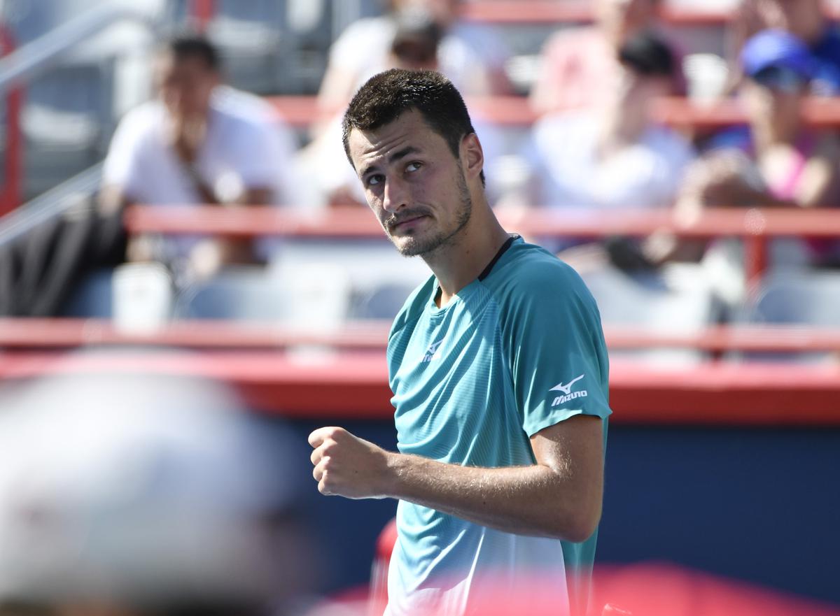Forgotten man Tomic earns first Tour win since 2021