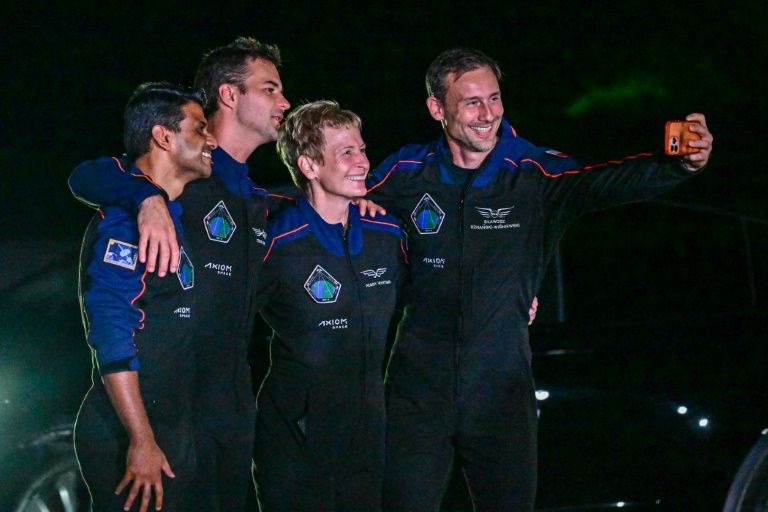 Spaceship carrying astronauts from india, poland, hungary, docks with iss