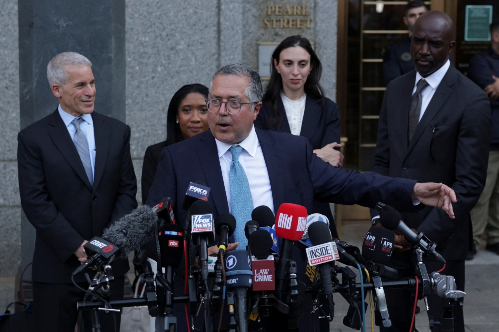Jury clears Sean Combs of racketeering, convicts him on prostitution-related charges; bail denied