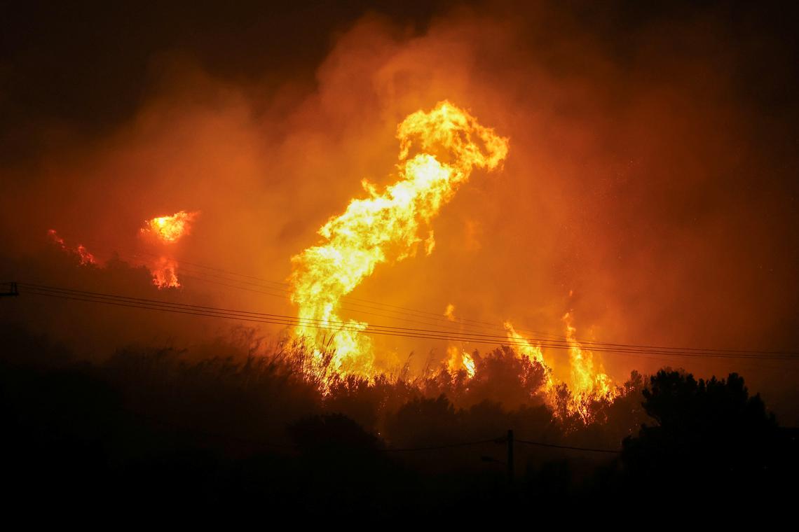 Greek firefighters battle wildfire on island of Crete