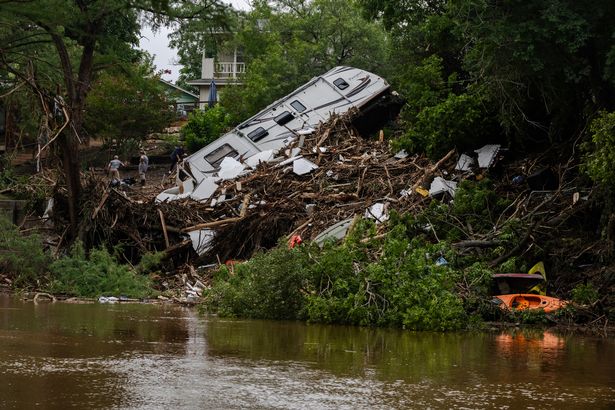 Texas floods miracle as two missing girls 'found alive clinging to 30ft tree'