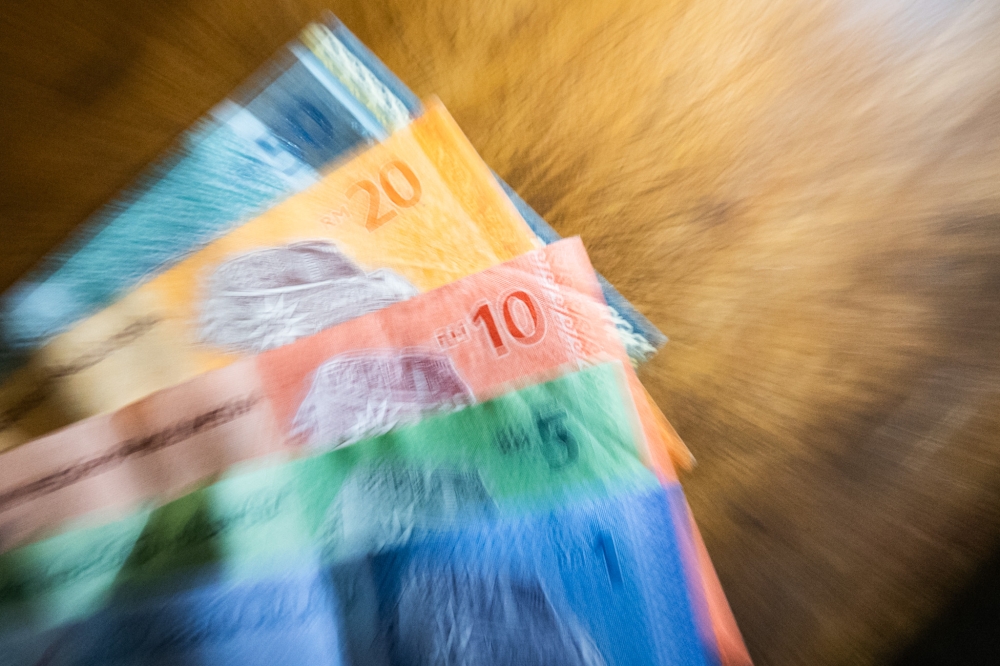 Ringgit slips as investors await US inflation gauge and Fed signals