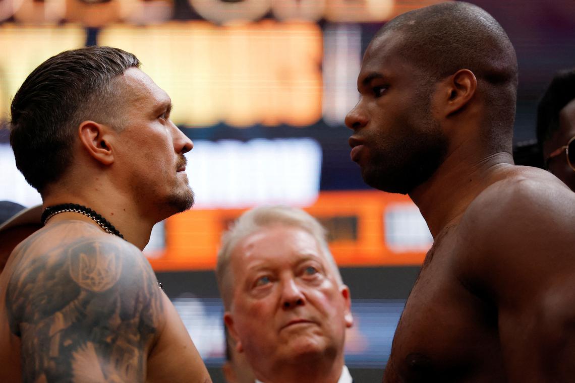 Boxing-Usyk winds up Dubois in Wembley weigh-in ahead of heavyweight fight