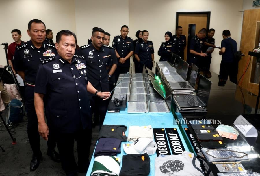 [UPDATED] Police bust porn scam syndicate, 57 arrested