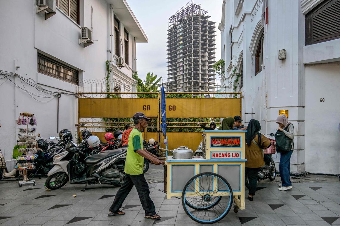 Indonesia says its poverty rate is the lowest in two decades