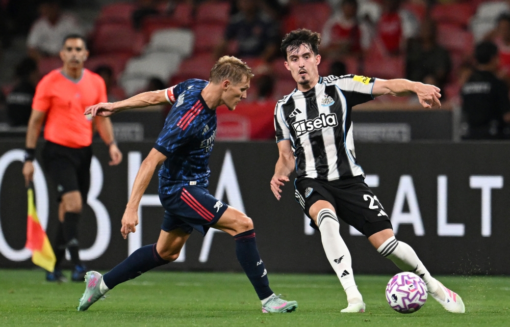 Late Odegaard penalty seals Arsenal’s 3-2 win over Newcastle in Singapore pre-season clash