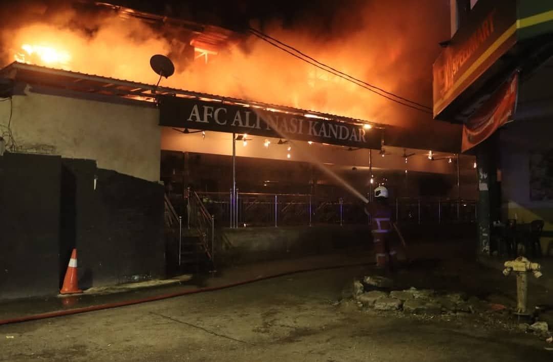 Fire razes 14 squatter houses, four shops in KL
