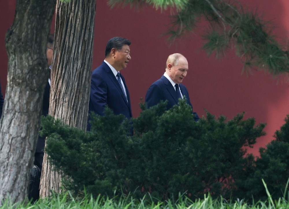 China’s Xi stages ‘Axis of Upheaval’ summit with Russia’s Putin and N. Korea’s Kim, sidelining Trump