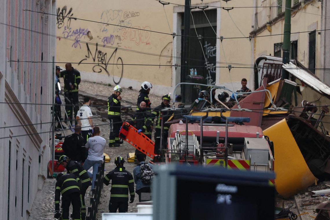 At least 15 killed as Lisbon’s historic funicular derails and crashes into building