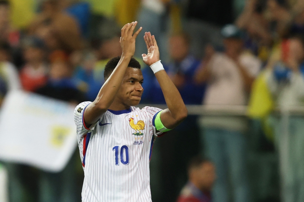 Mbappe celebrates tying Thierry Henry’s all-time France record with 51 goals, but says team titles come first