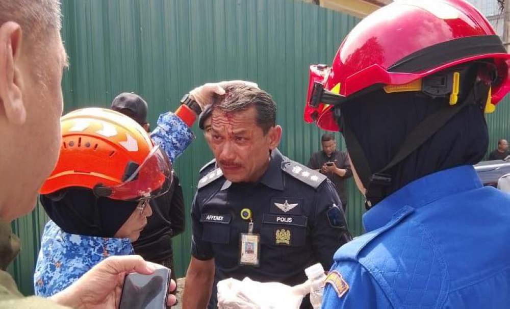 KL top cop confirms arrests, says ‘extremely upset’ over rock attack on Dang Wangi police chief in Kampung Sungai Baru