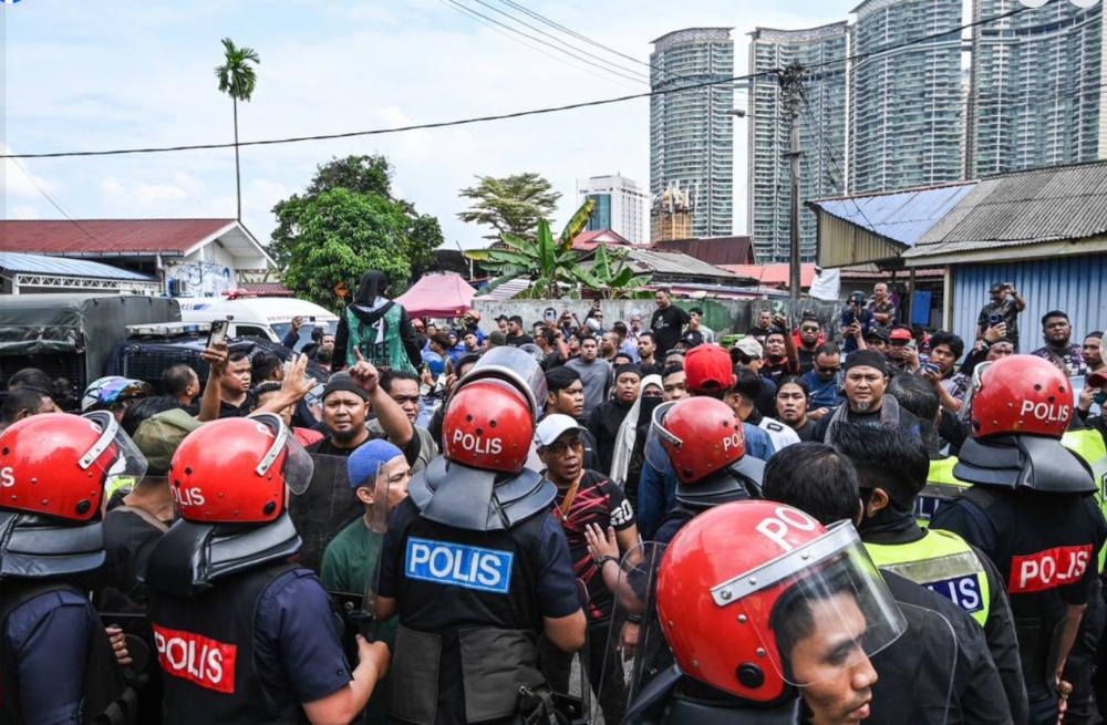 Eight to face charges over Kampung Sungai Baru clash that injured ex-Dang Wangi police chief